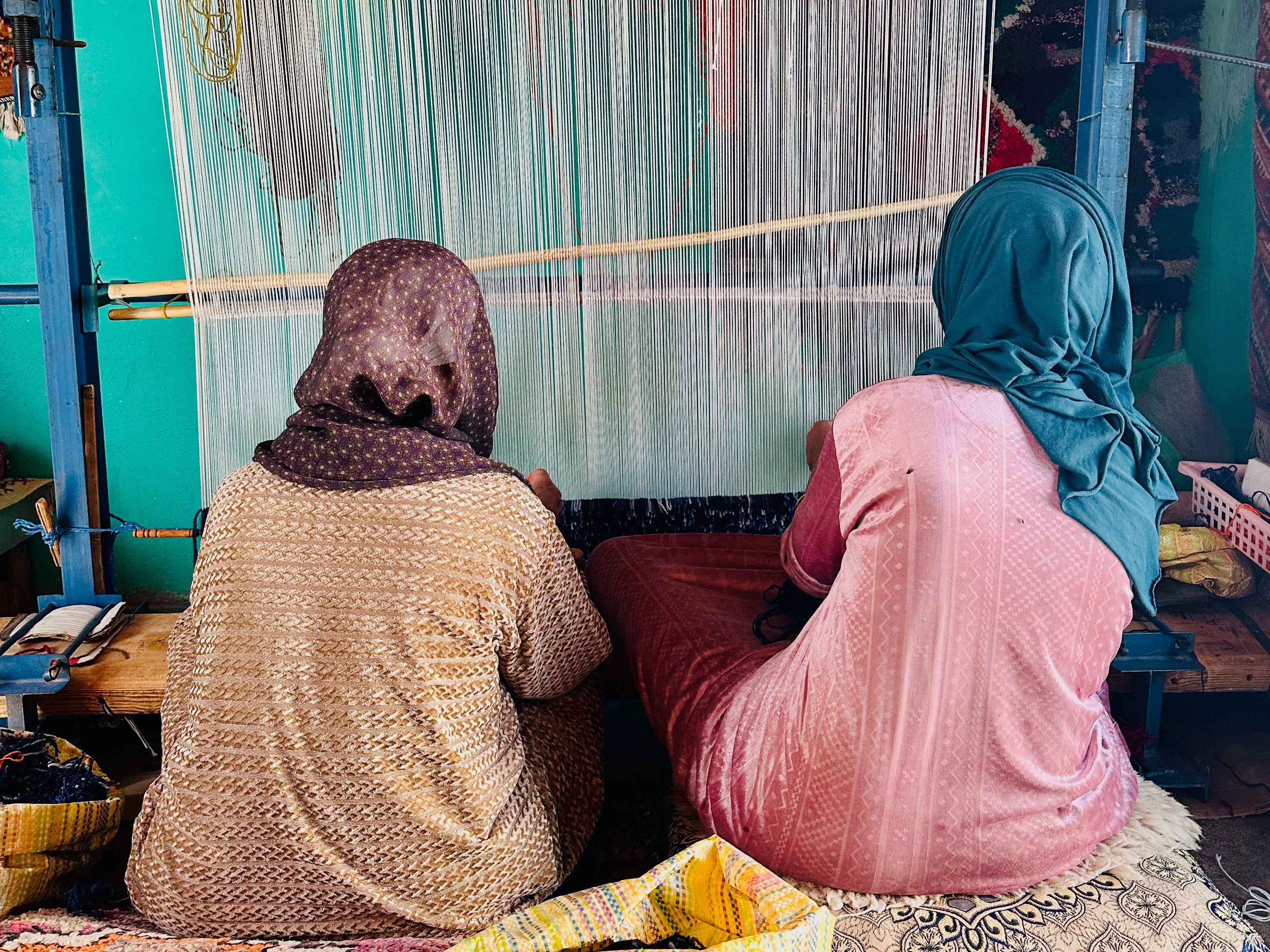 Moroccan women weaving rug on loom-SAINT RIDGE